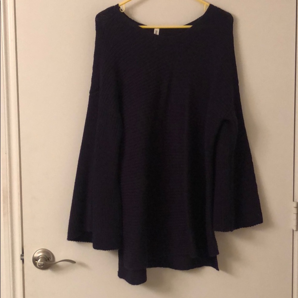 Bell sleeve over sized sweater